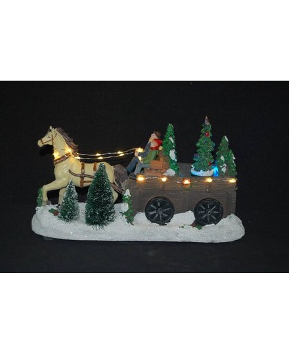 Paard en wagen met kerstbomen