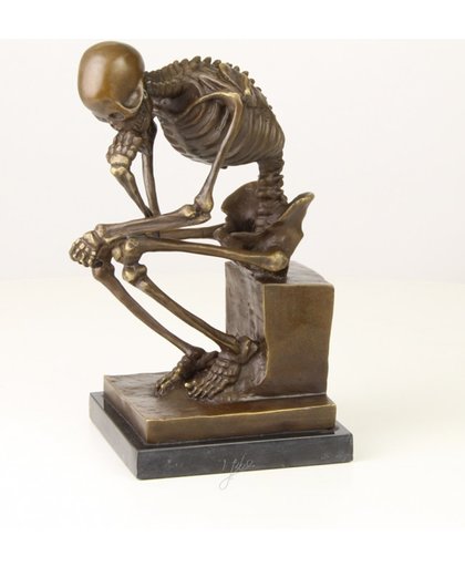Bronzen beeld van een skelet denker