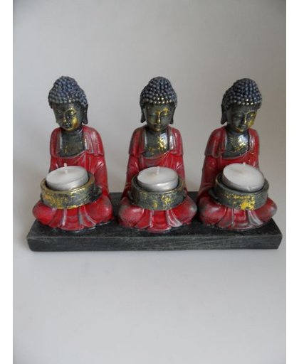 Drie Thaise boeddha's waxine houders lengte 25 cm breedte 8 cm hoogte 17 cm.