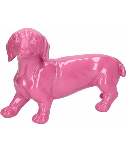 Dierenbeeld Teckel hond roze 29 cm - honden beeldje voor binnen en buiten