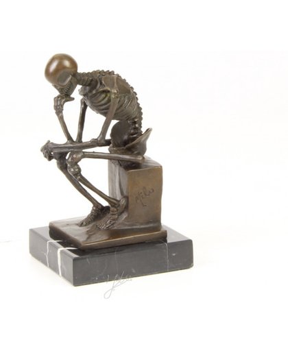 Bronzen beeld van een skelet denker